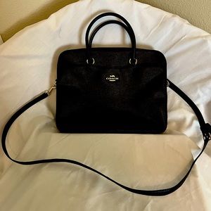 Black Coach laptop bag with Detachable shoulder strap.